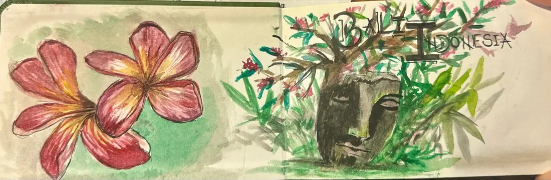 A page from Ana's Bali sketchbook: watercolor frangipani flowers and a stone face among leaves